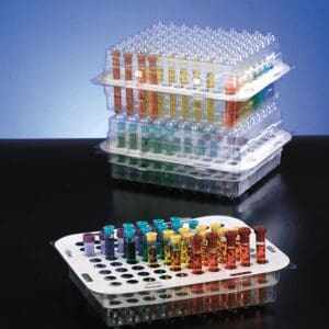 A tray of test tubes on top of a table.