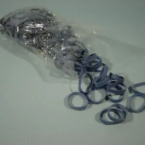 A bag of rubber bands on top of a table.